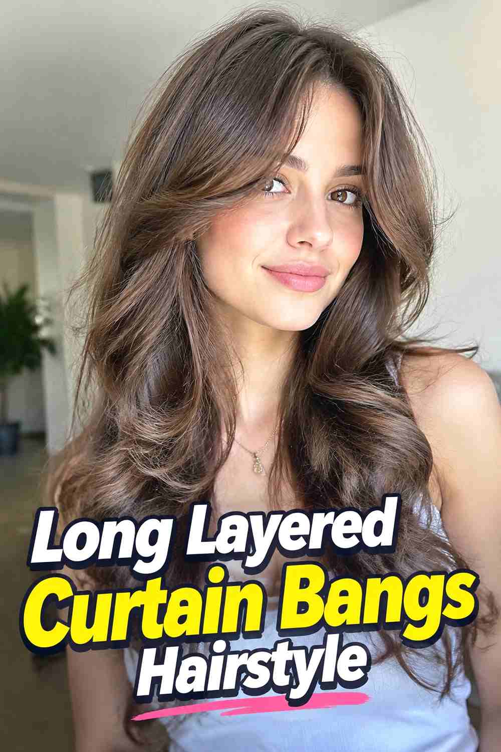 2. Long Layered Curtain Bangs Hairstyle