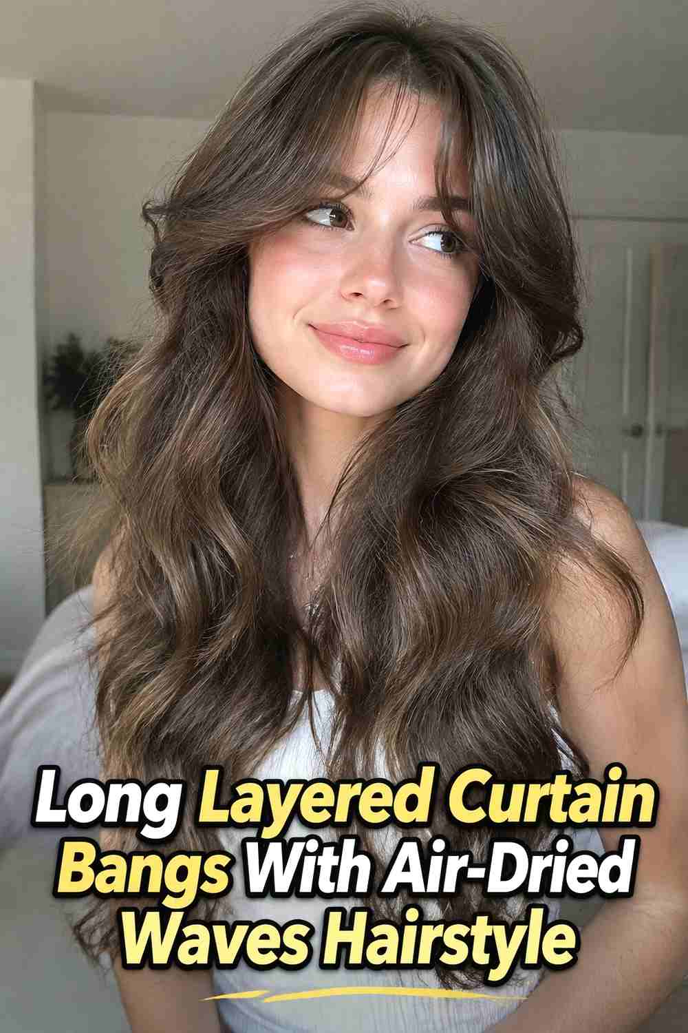 2. Long Layered Curtain Bangs With Air Dried Waves Hairstyle