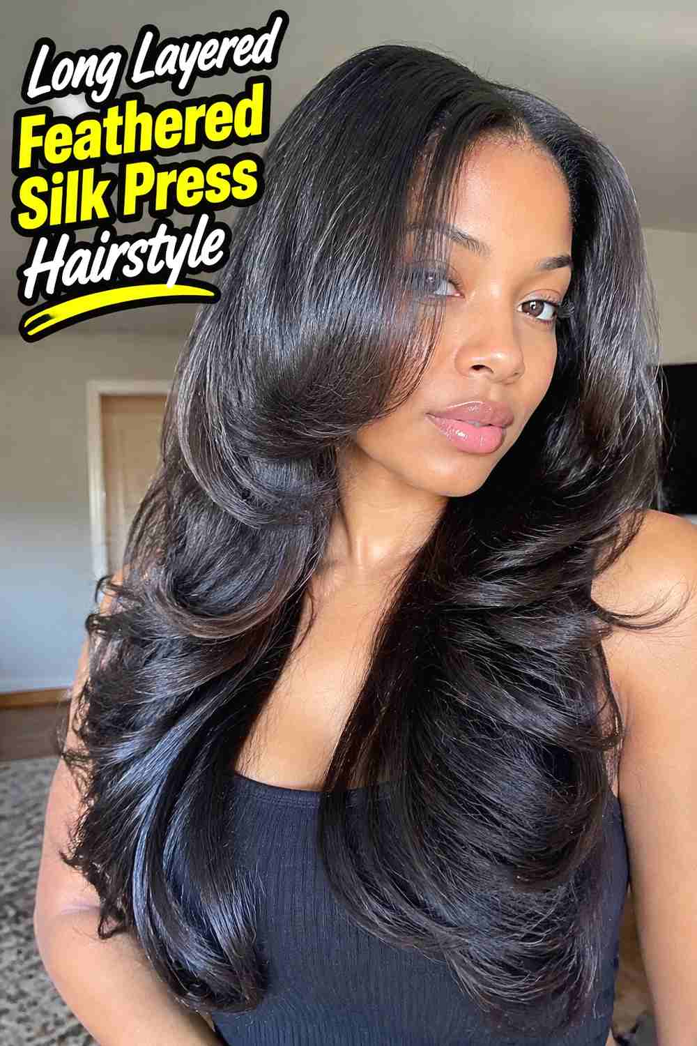 4. Long Layered Feathered Silk Press Hairstyle