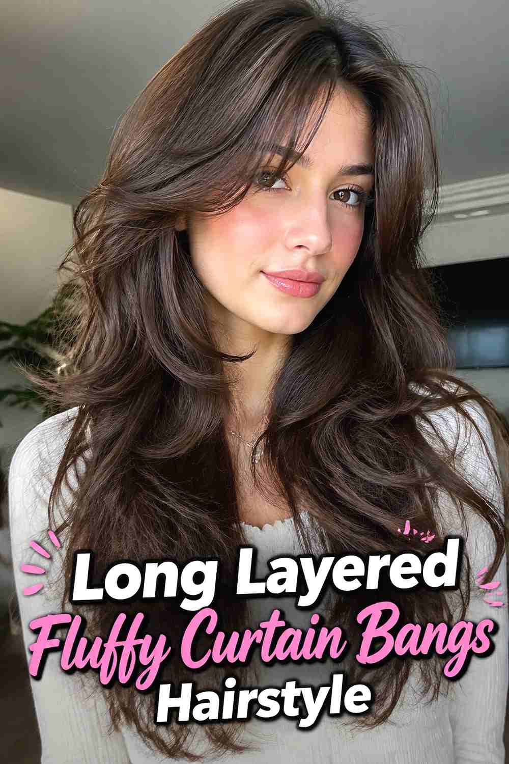 1. Long Layered Fluffy Curtain Bangs Hairstyle