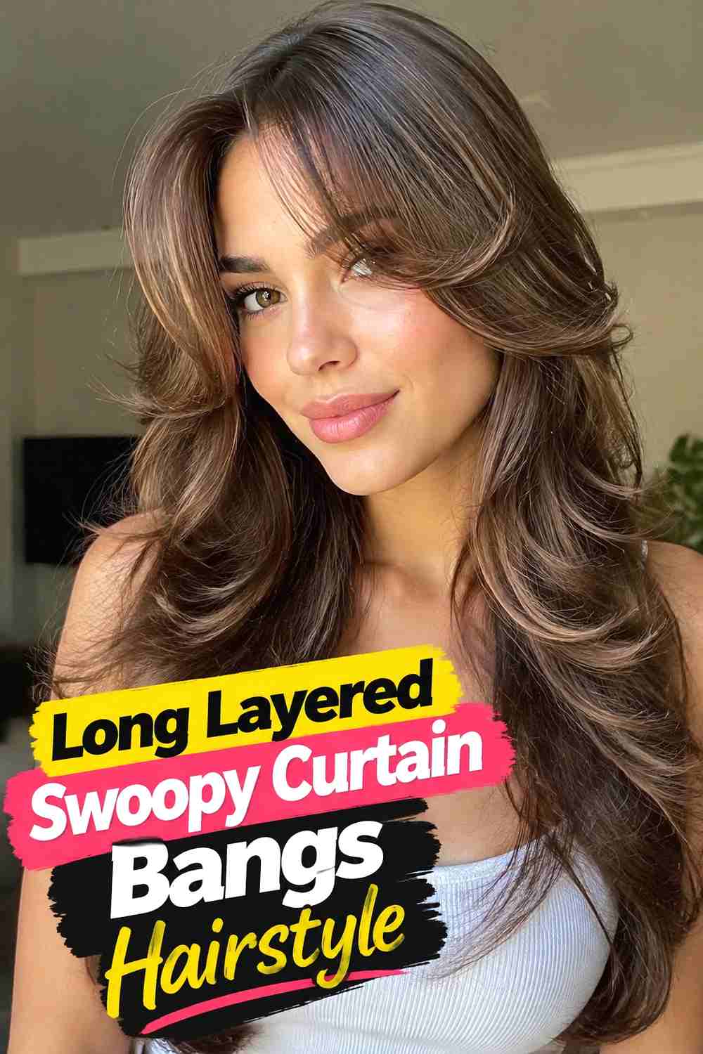 2. Long Layered Swoopy Curtain Bangs Hairstyle