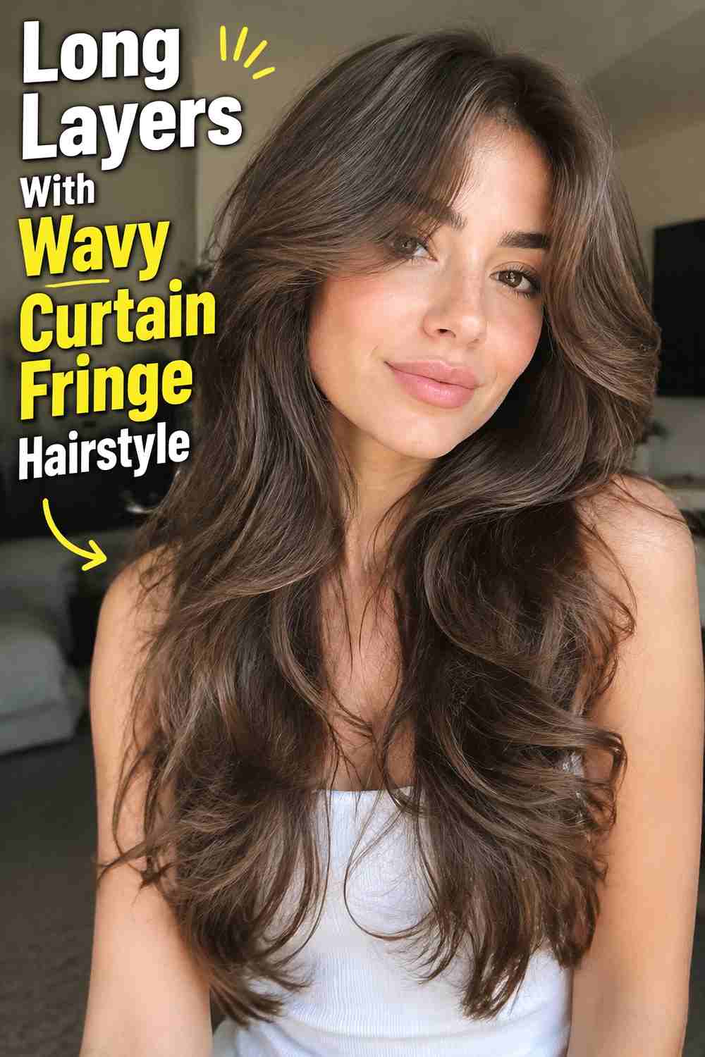 2. Long Layers With Wavy Curtain Fringe Hairstyle