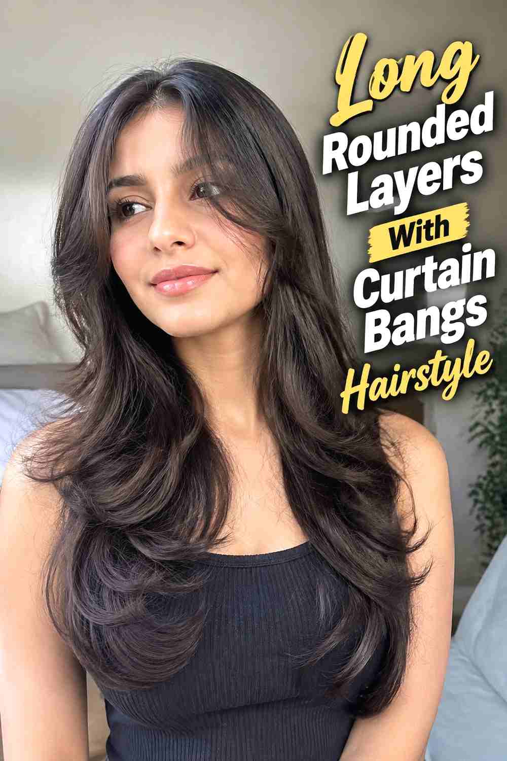 2. Long Rounded Layers With Curtain Bangs Hairstyle