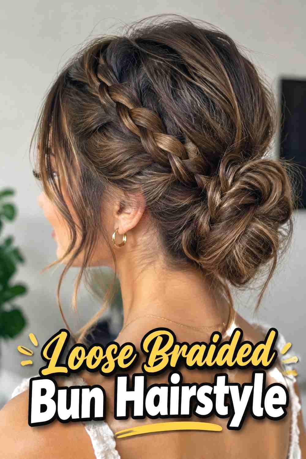 10. Loose Braided Bun Hairstyle