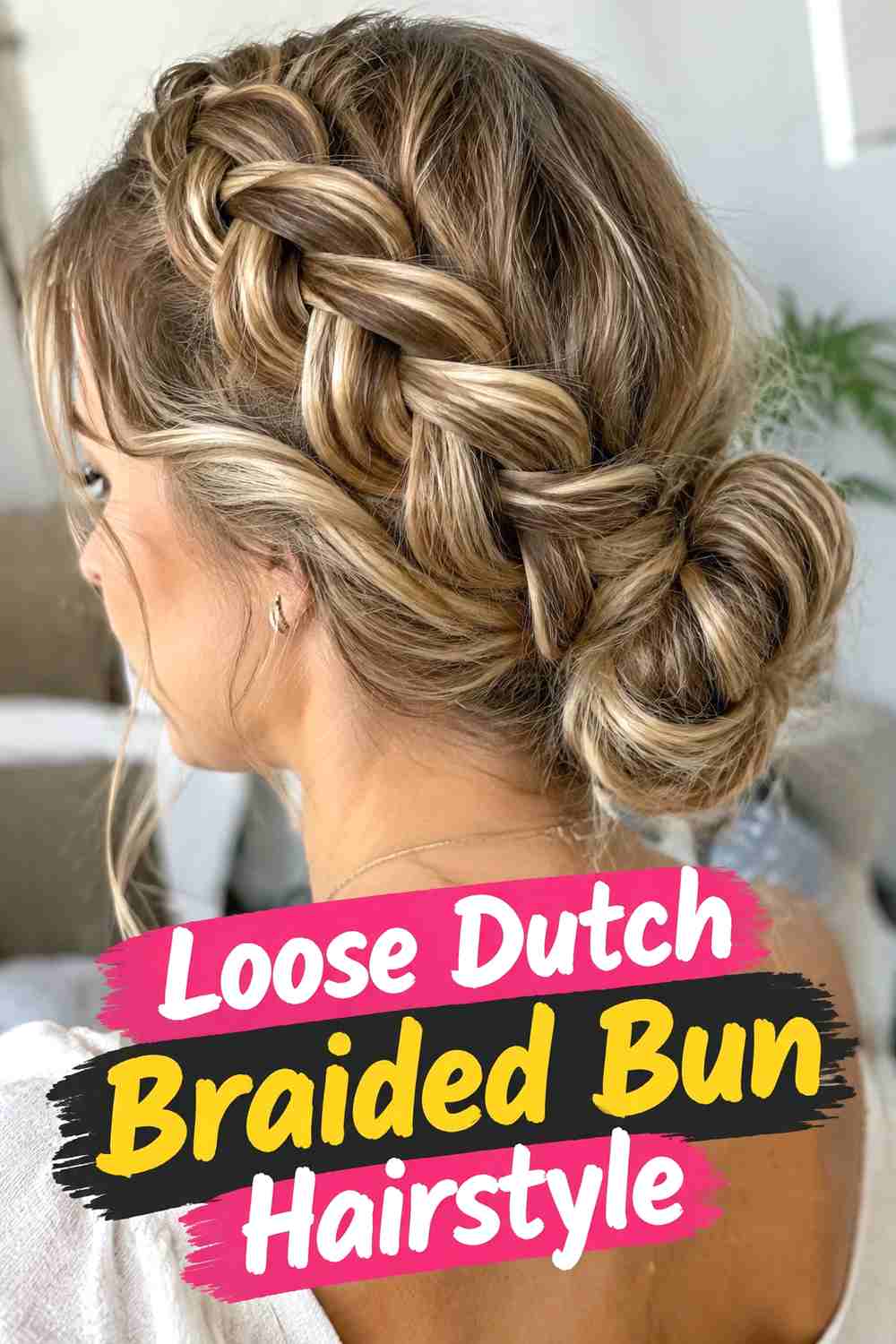 2. Loose Dutch Braided Bun Hairstyle