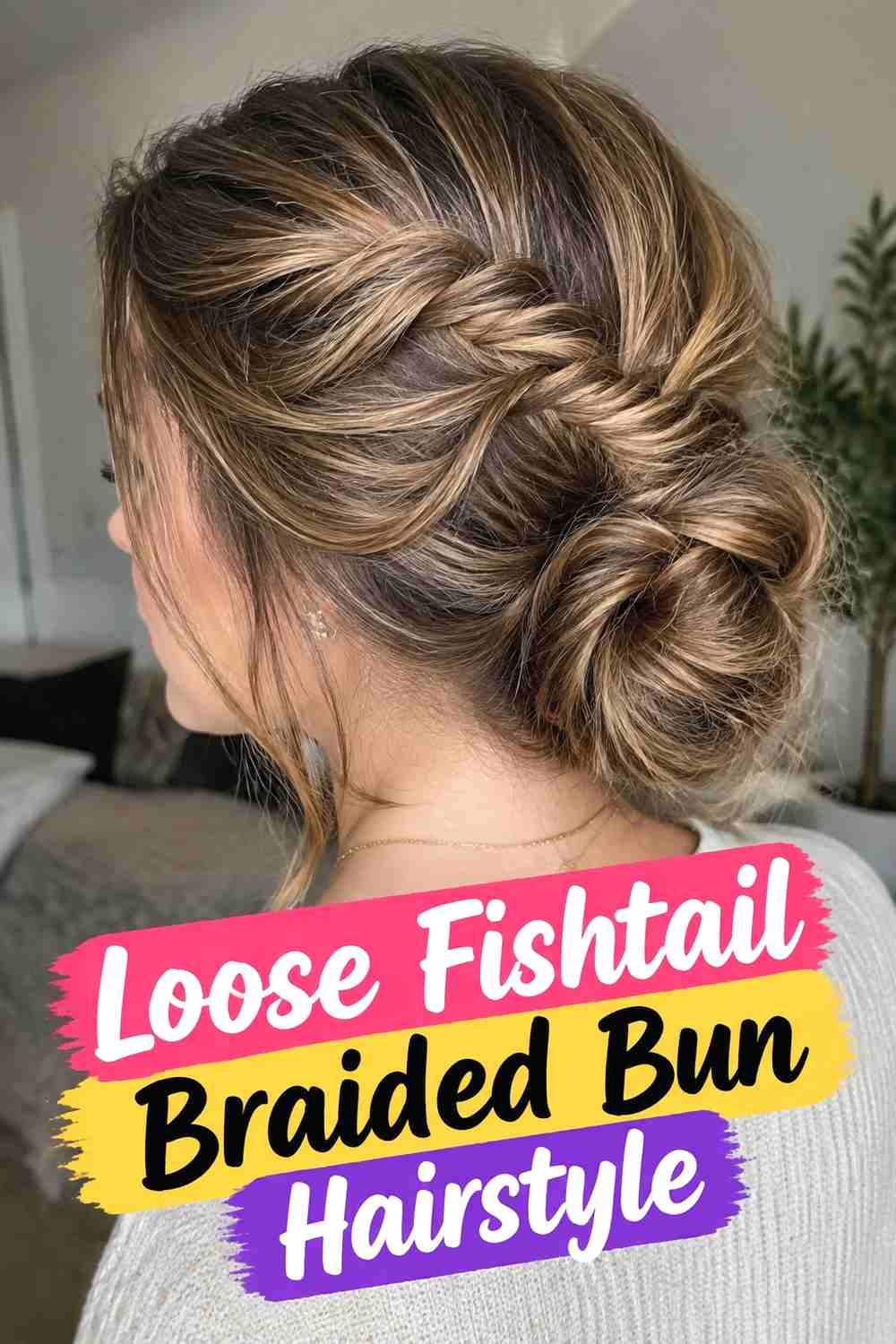 2. Loose Fishtail Braided Bun Hairstyle