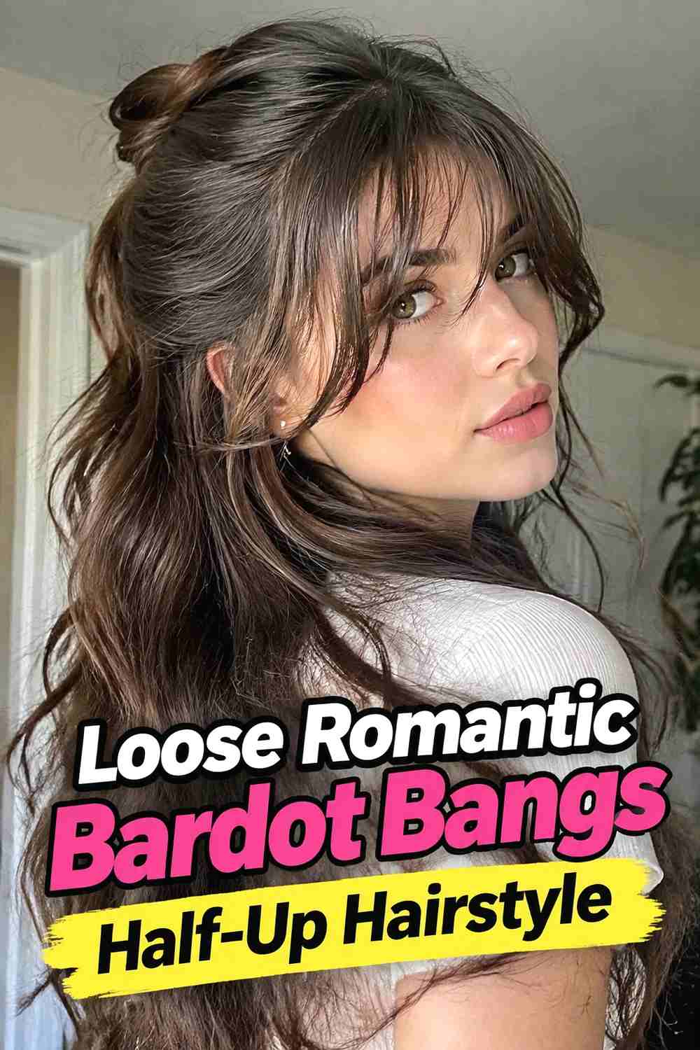 18. Loose Romantic Bardot Bangs Half Up Hairstyle