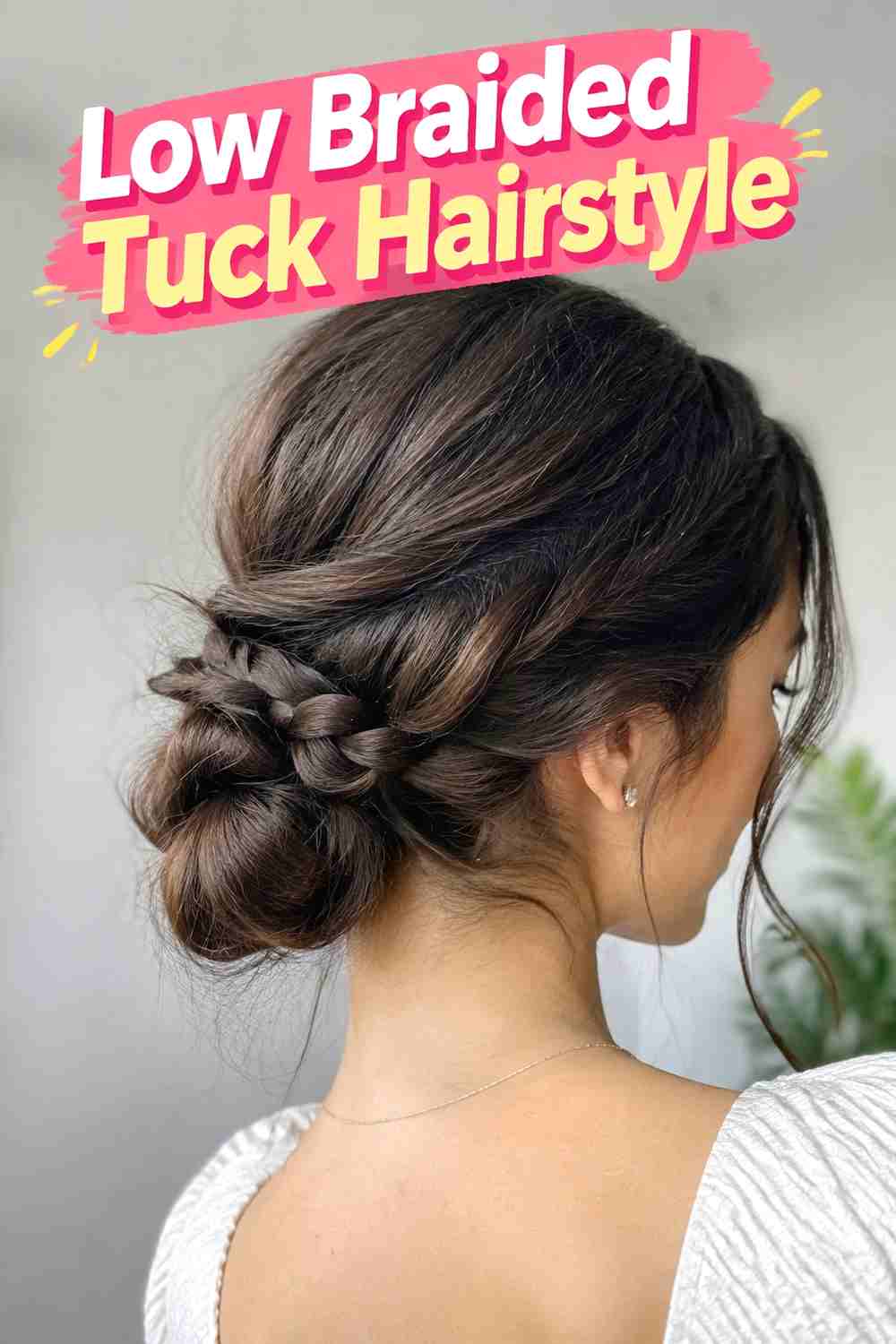 1. Low Braided Tuck Hairstyle