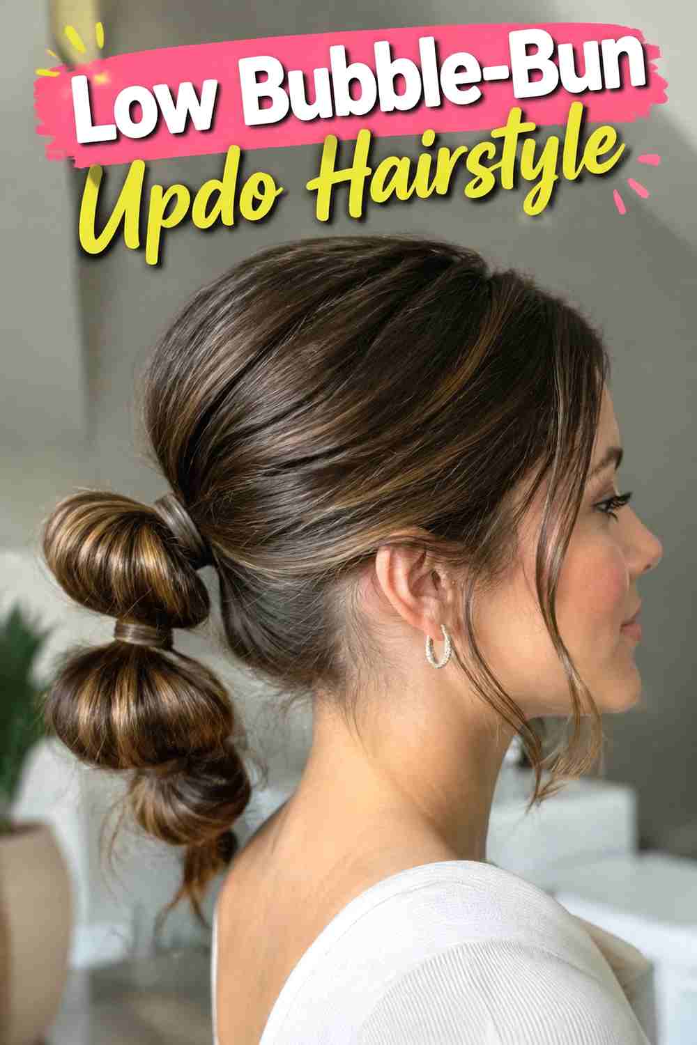 12. Low Bubble Bun Updo Hairstyle