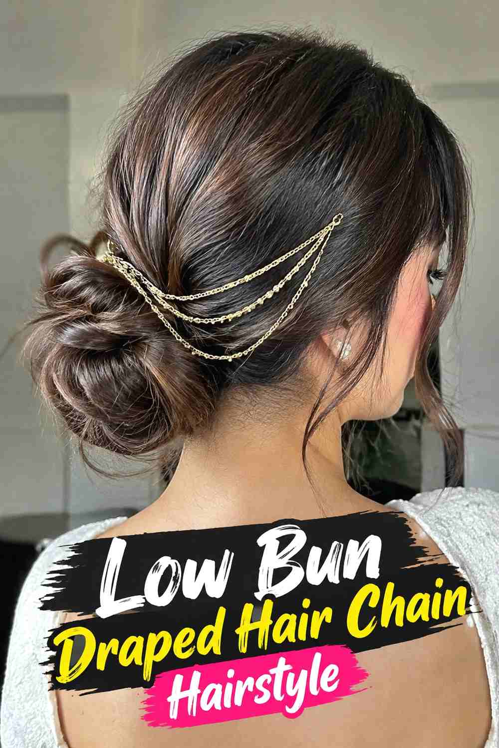 3. Low Bun Draped Hair Chain Hairstyle