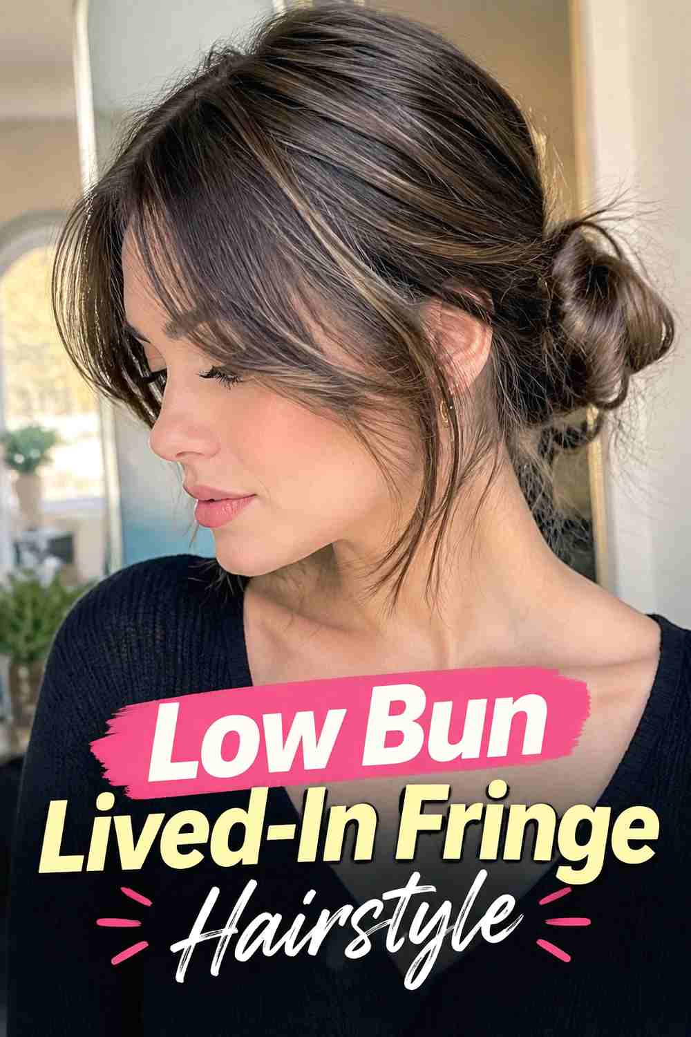 12. Low Bun Lived In Fringe Hairstyle
