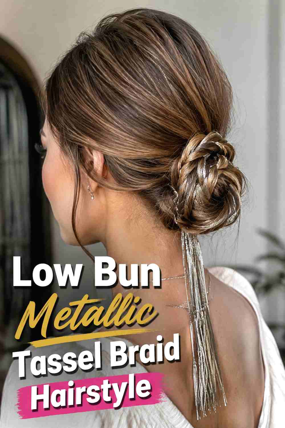 9. Low Bun Metallic Tassel Braid Hairstyle