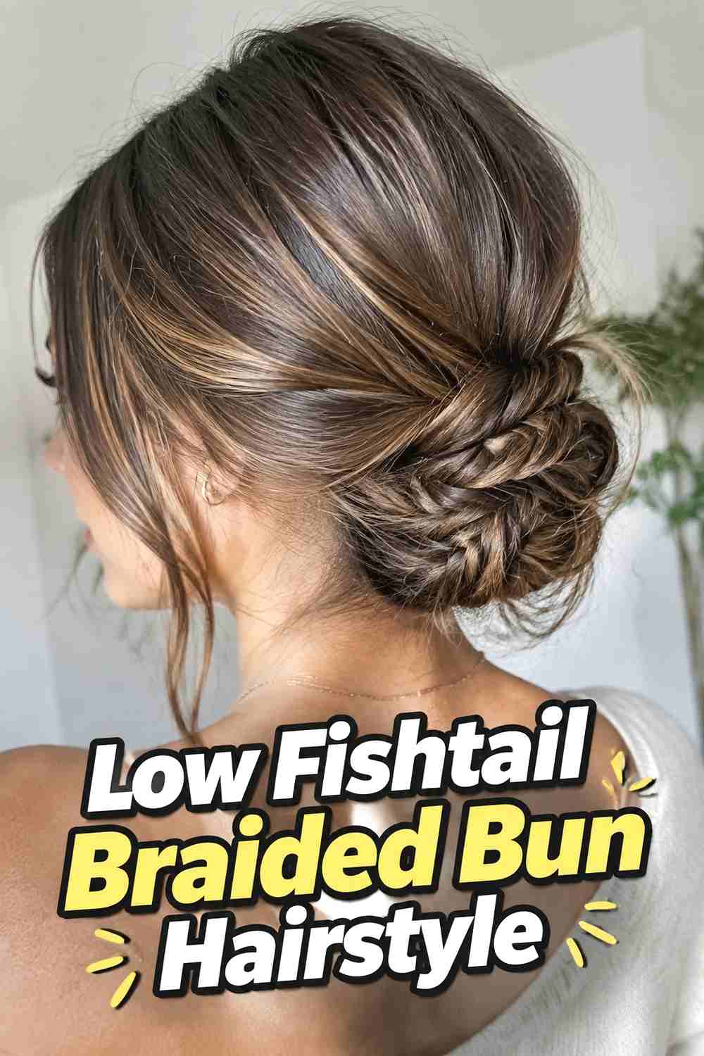 6. Low Fishtail Braided Bun Hairstyle