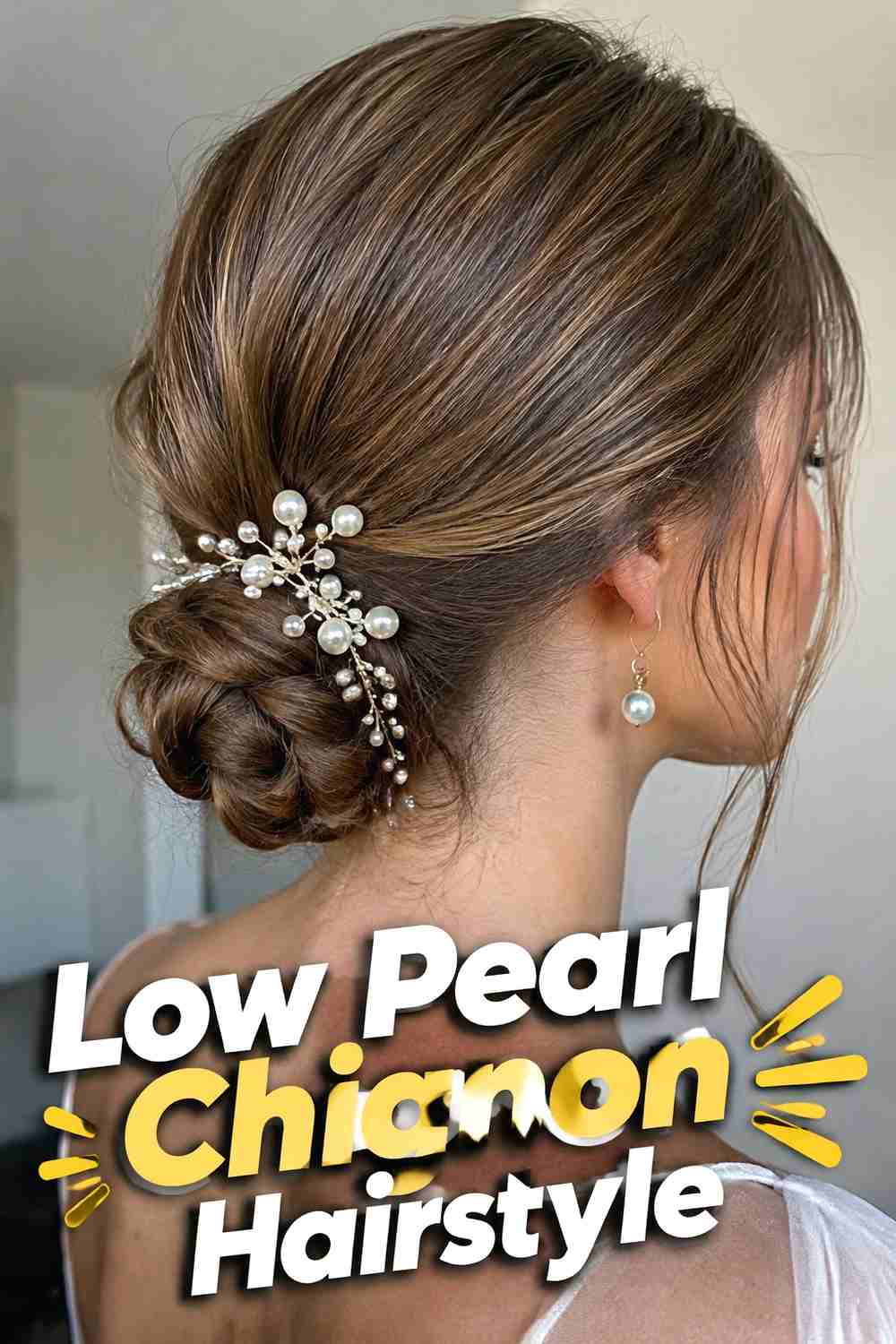 2. Low Pearl Chignon Hairstyle