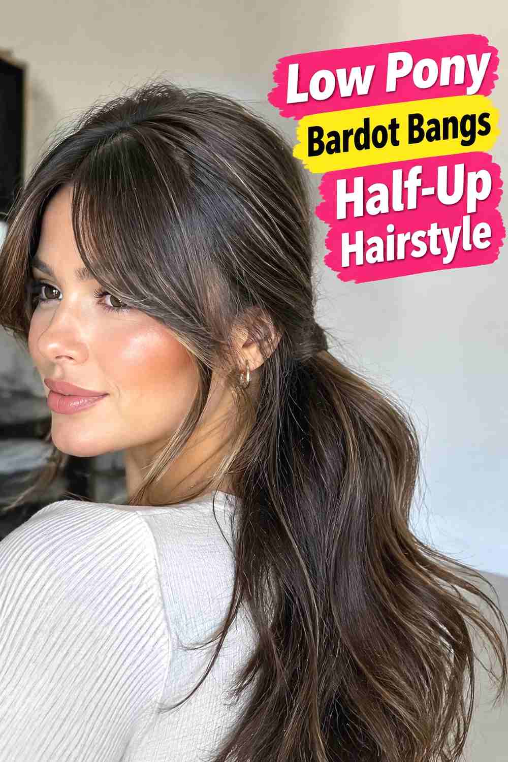 4. Low Pony Bardot Bangs Half Up Hairstyle