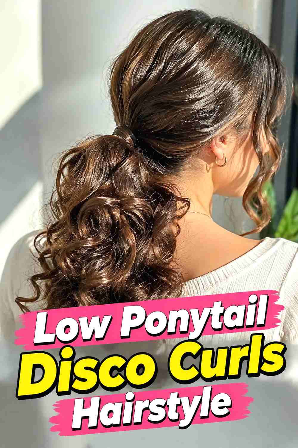 9. Low Ponytail Disco Curls Hairstyle