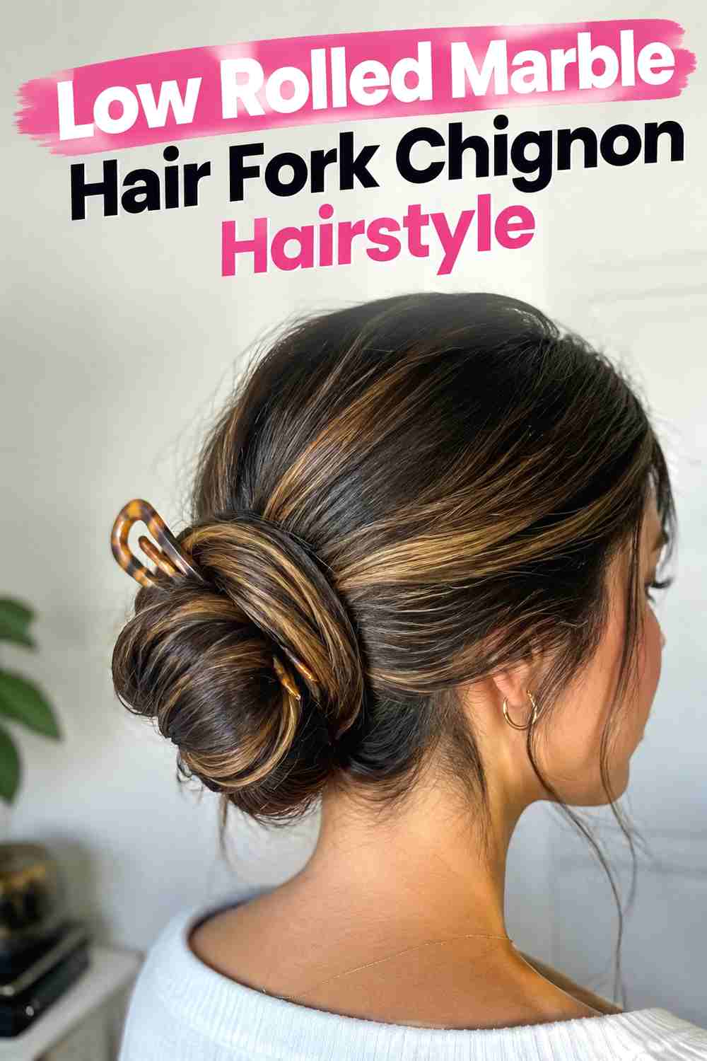 6. Low Rolled Marble Hair Fork Chignon Hairstyle