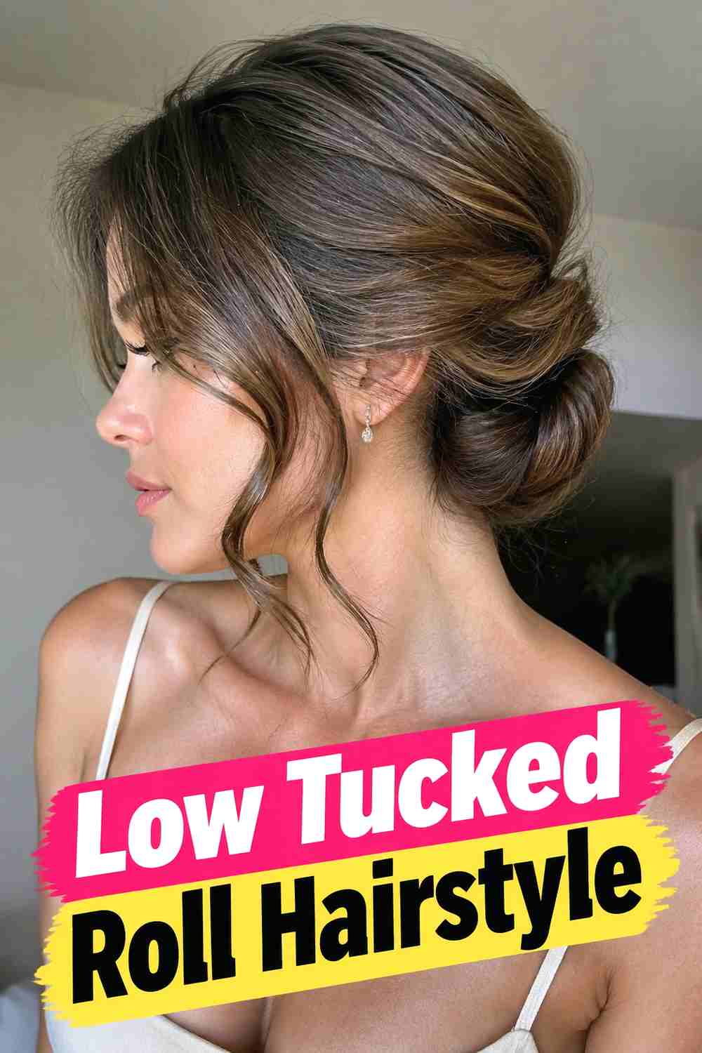 5. Low Tucked Roll Hairstyle