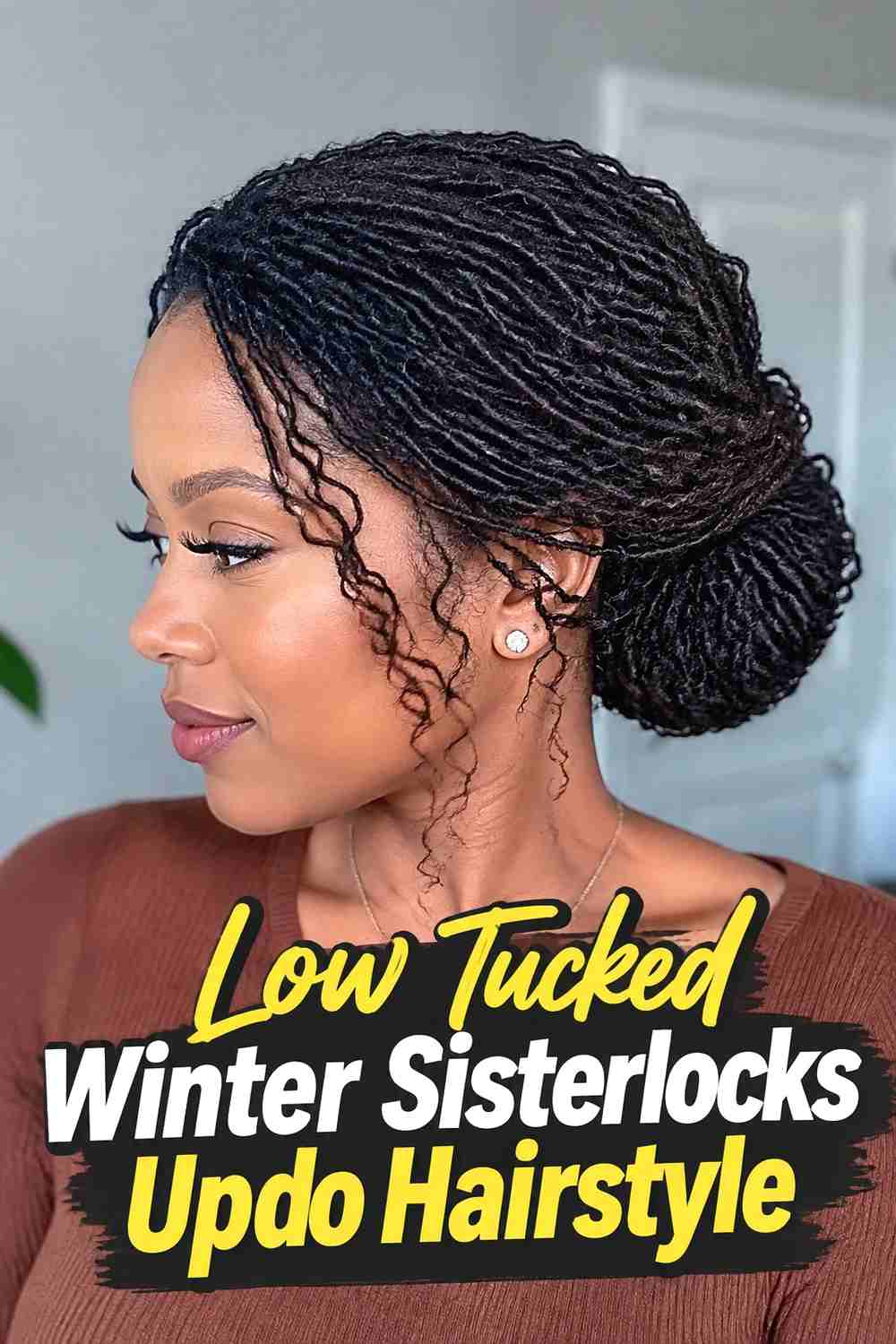 2. Low Tucked Winter Sisterlocks Updo Hairstyle