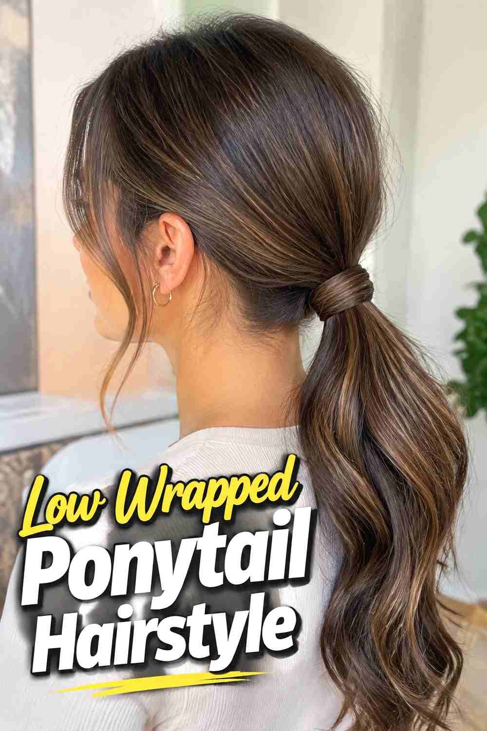2. Low Wrapped Ponytail Hairstyle