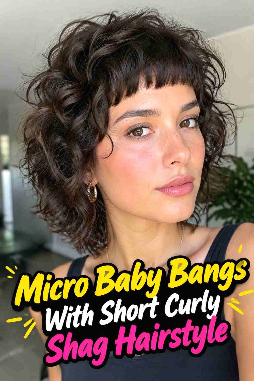 3. Micro Baby Bangs With Short Curly Shag Hairstyle