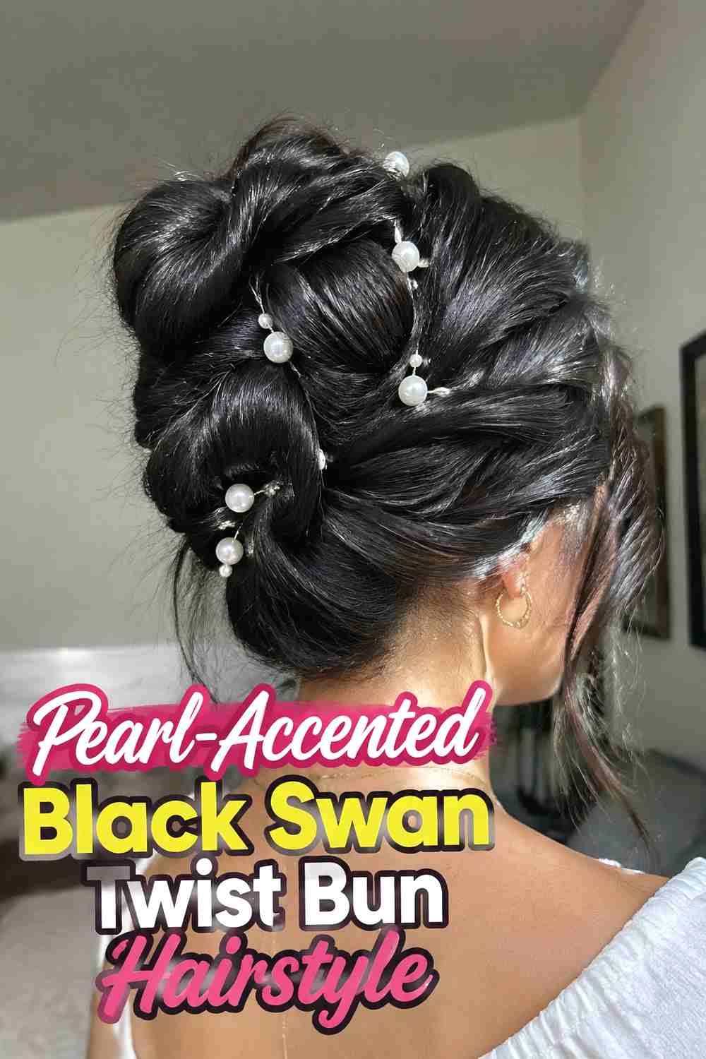 13. Pearl Accented Black Swan Twist Bun Hairstyle