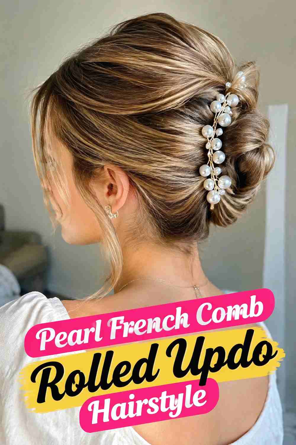 2. Pearl French Comb Rolled Updo Hairstyle