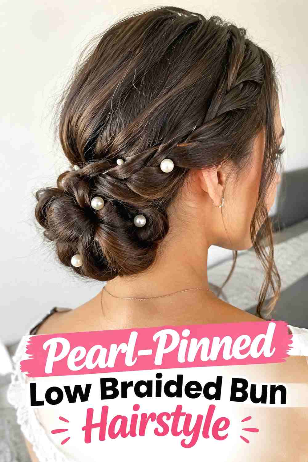 12. Pearl Pinned Low Braided Bun Hairstyle