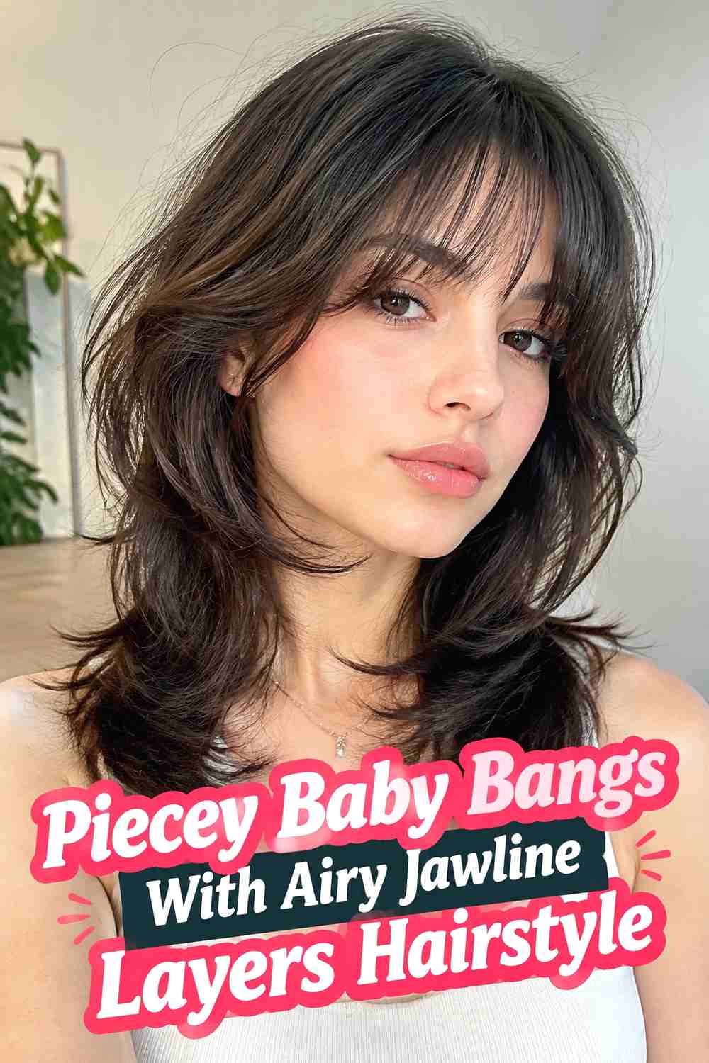 4. Piecey Baby Bangs With Airy Jawline Layers Hairstyle