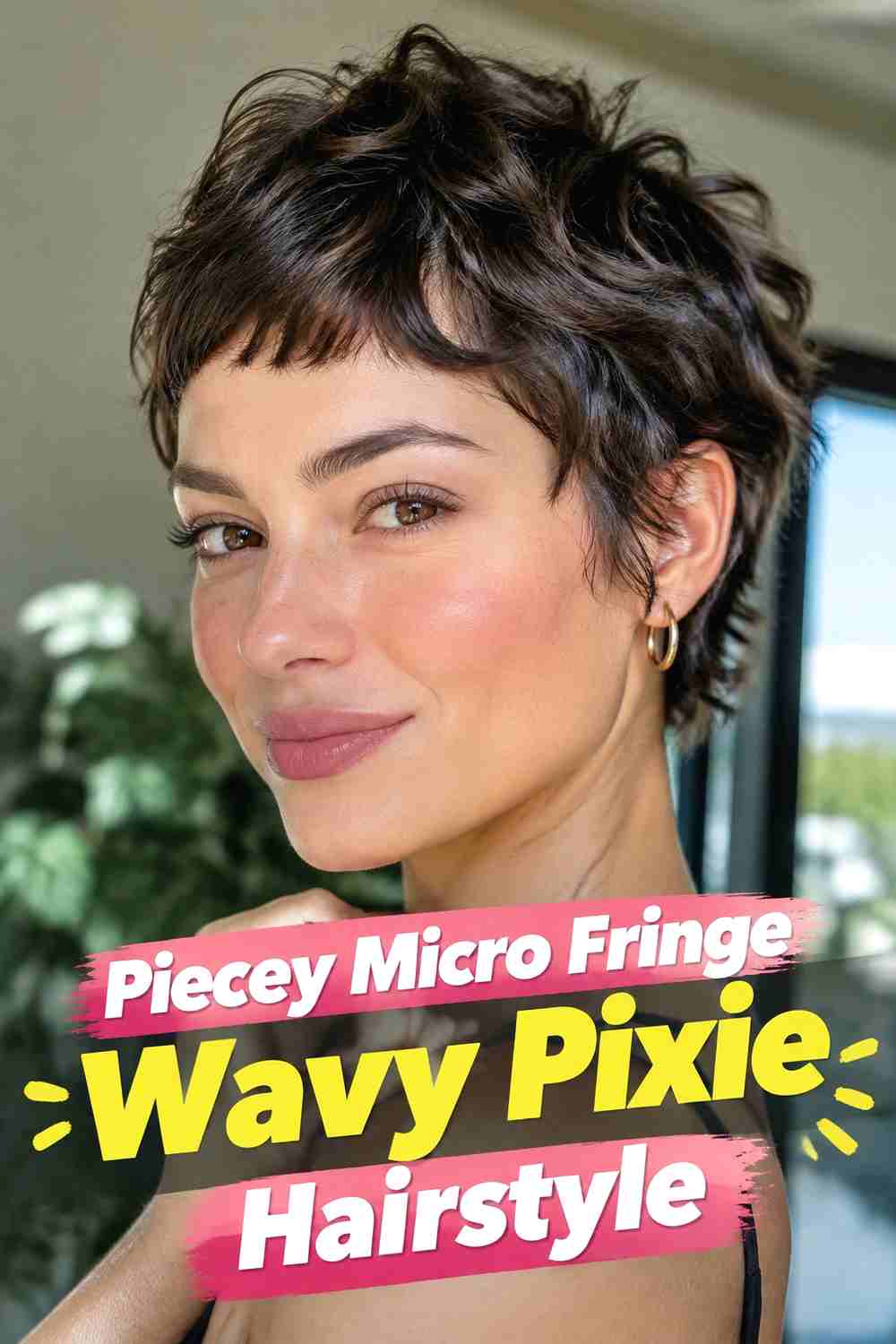 11. Piecey Micro Fringe Wavy Pixie Hairstyle