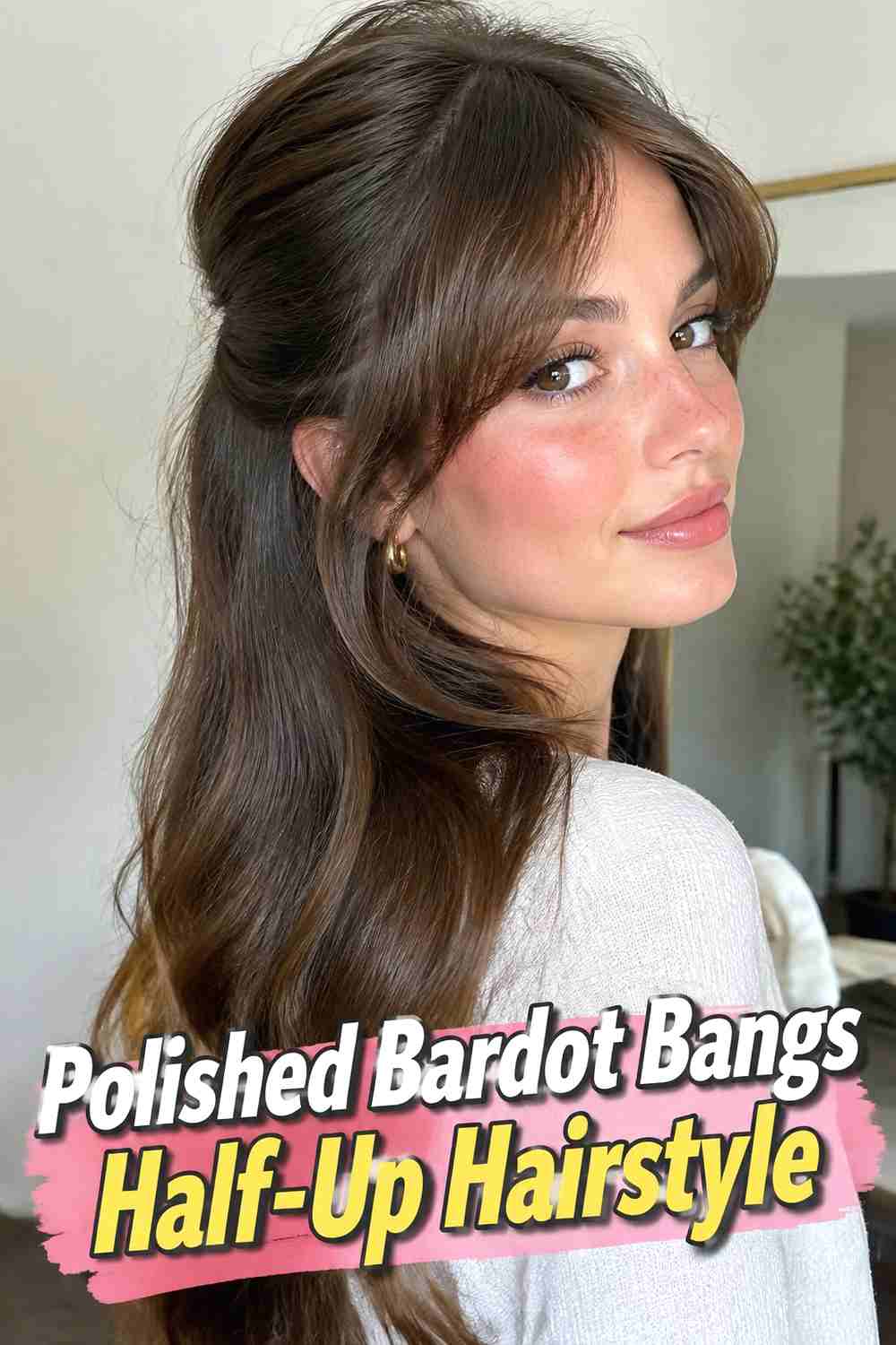 19. Polished Bardot Bangs Half Up Hairstyle