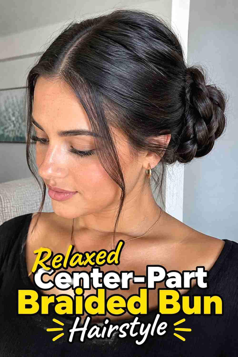 14. Relaxed Center Part Braided Bun Hairstyle