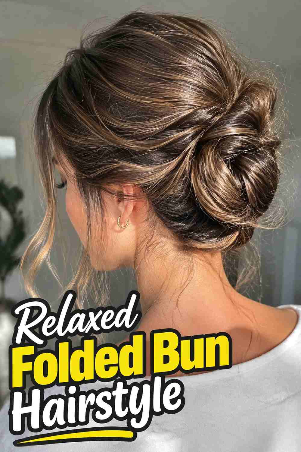 15. Relaxed Folded Bun Hairstyle