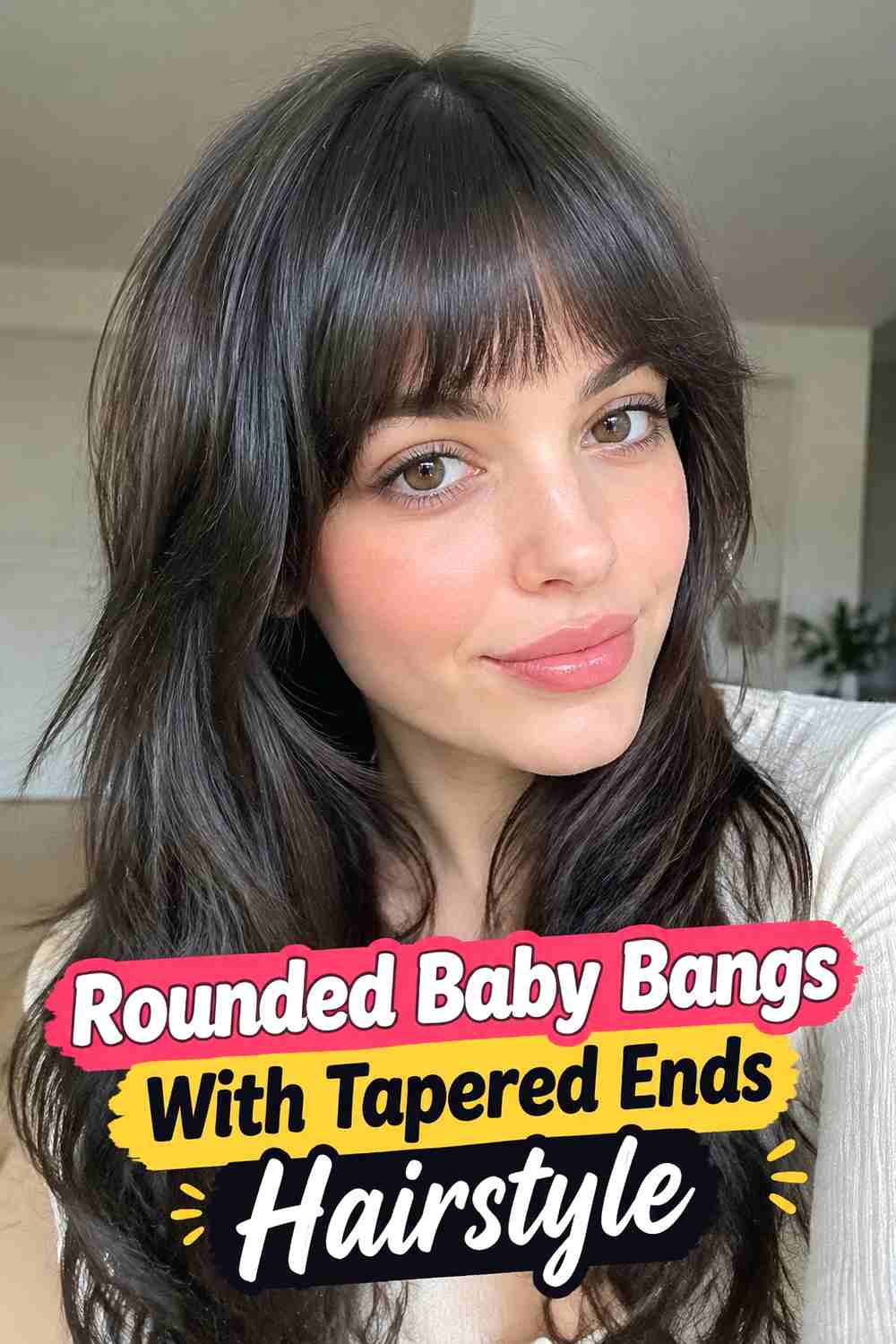 8. Rounded Baby Bangs With Tapered Ends Hairstyle