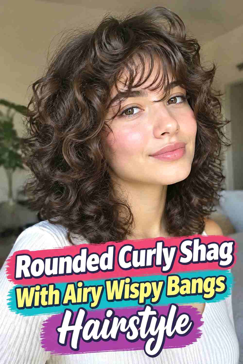 2. Rounded Curly Shag With Airy Wispy Bangs Hairstyle