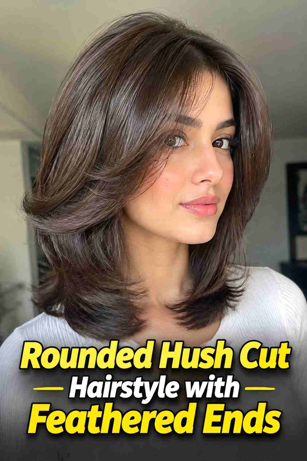 12. Rounded Hush Cut Hairstyle With Feathered Ends