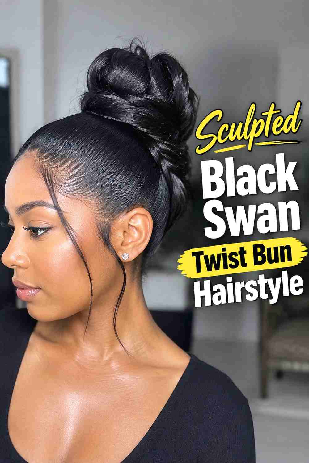 11. Sculpted Black Swan Twist Bun Hairstyle