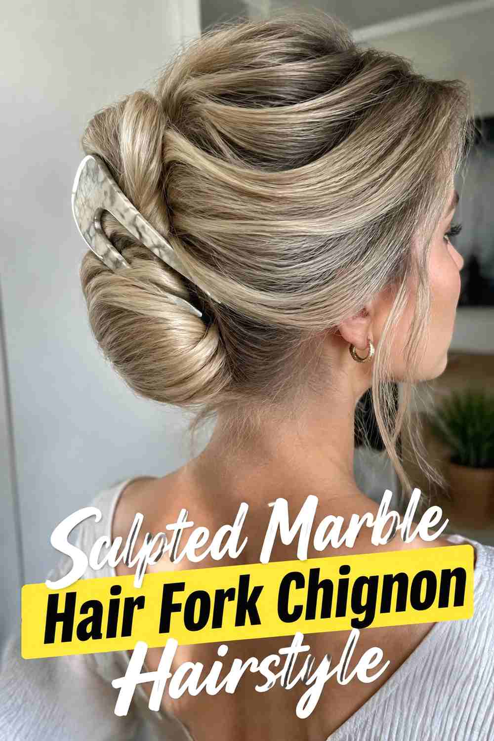 8. Sculpted Marble Hair Fork Chignon Hairstyle