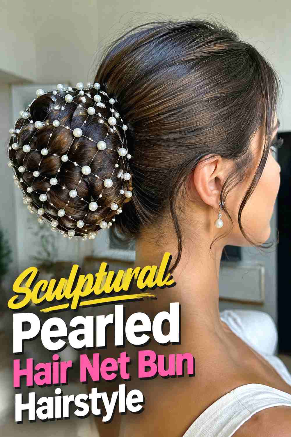 12. Sculptural Pearled Hair Net Bun Hairstyle
