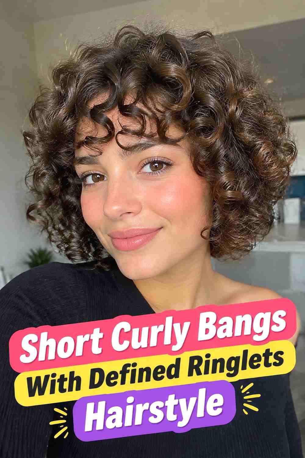 13. Short Curly Bangs With Defined Ringlets Hairstyle