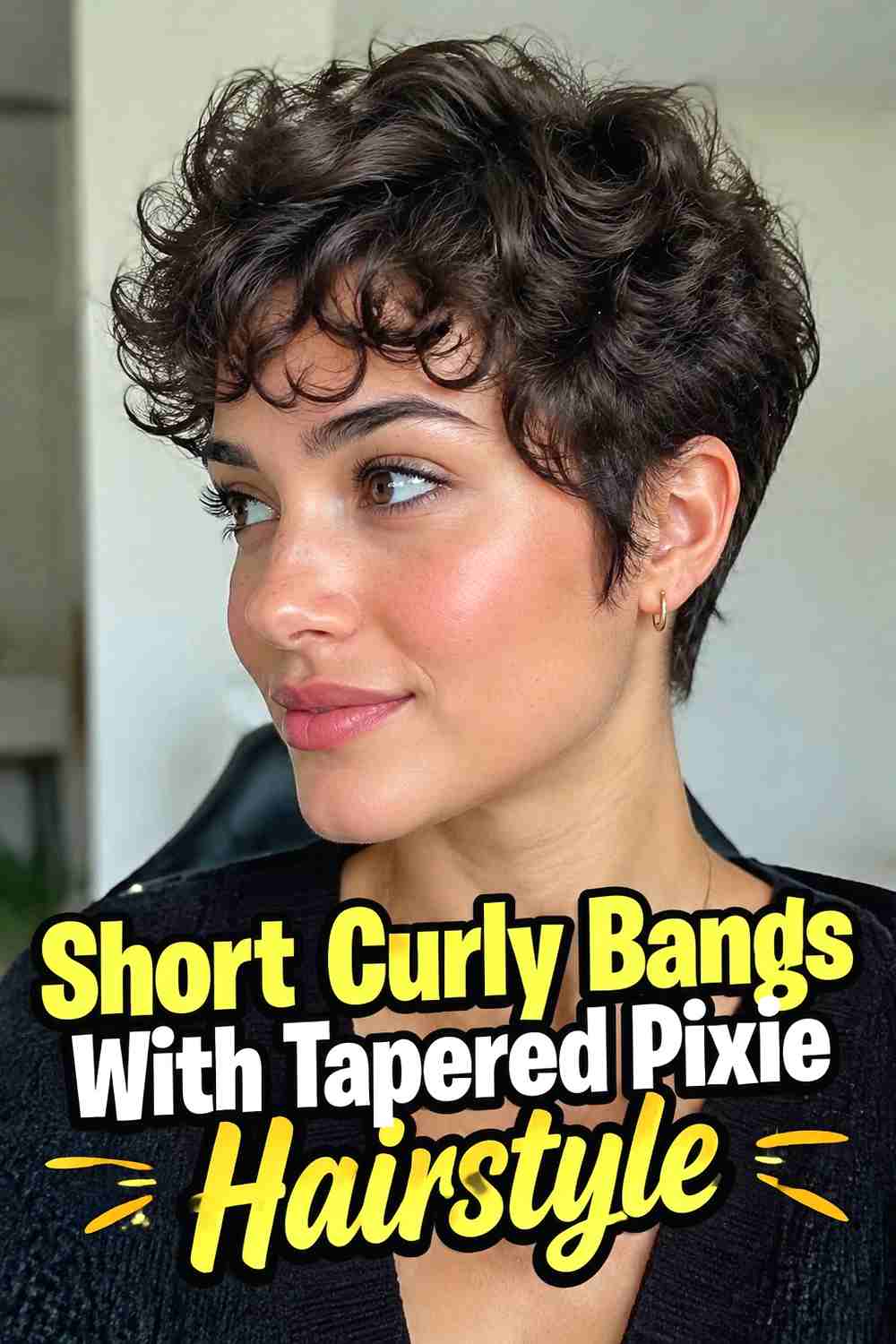 3. Short Curly Bangs With Tapered Pixie Hairstyle