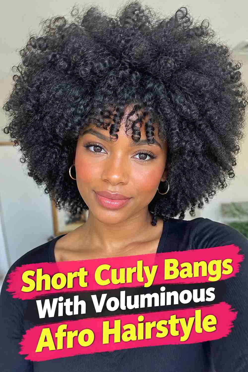 16. Short Curly Bangs With Voluminous Afro Hairstyle