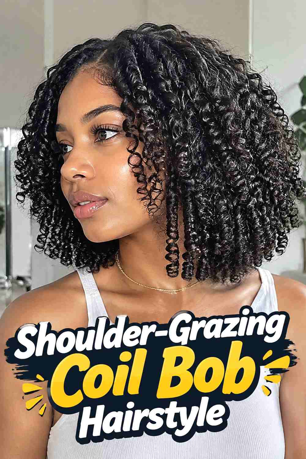 7. Shoulder Grazing Coil Bob Hairstyle