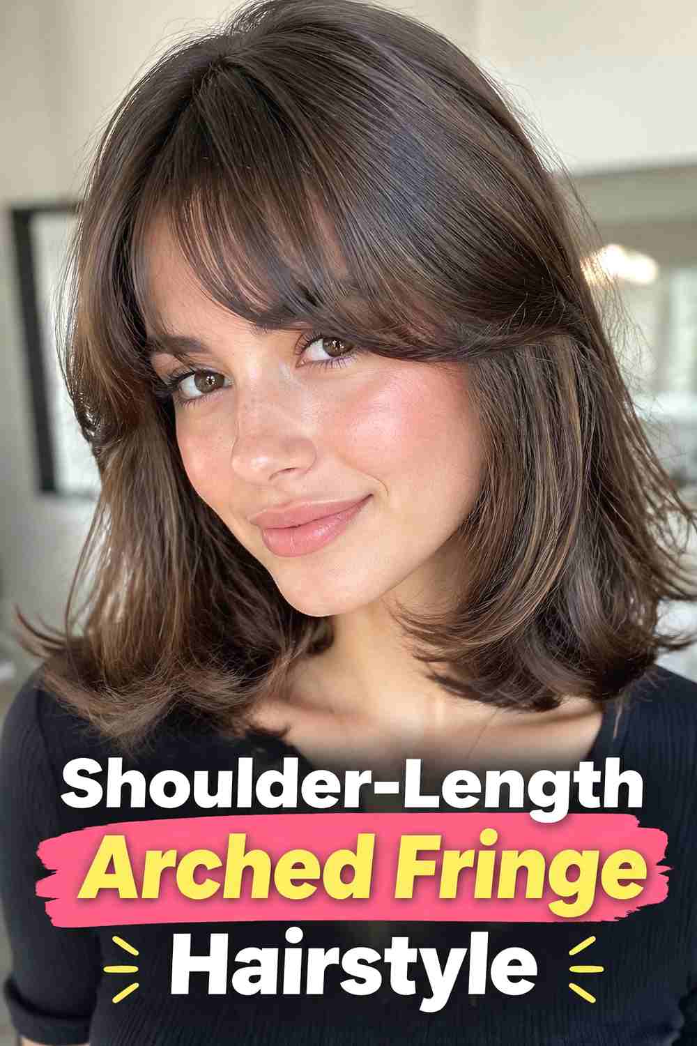 14. Shoulder Length Arched Fringe Hairstyle