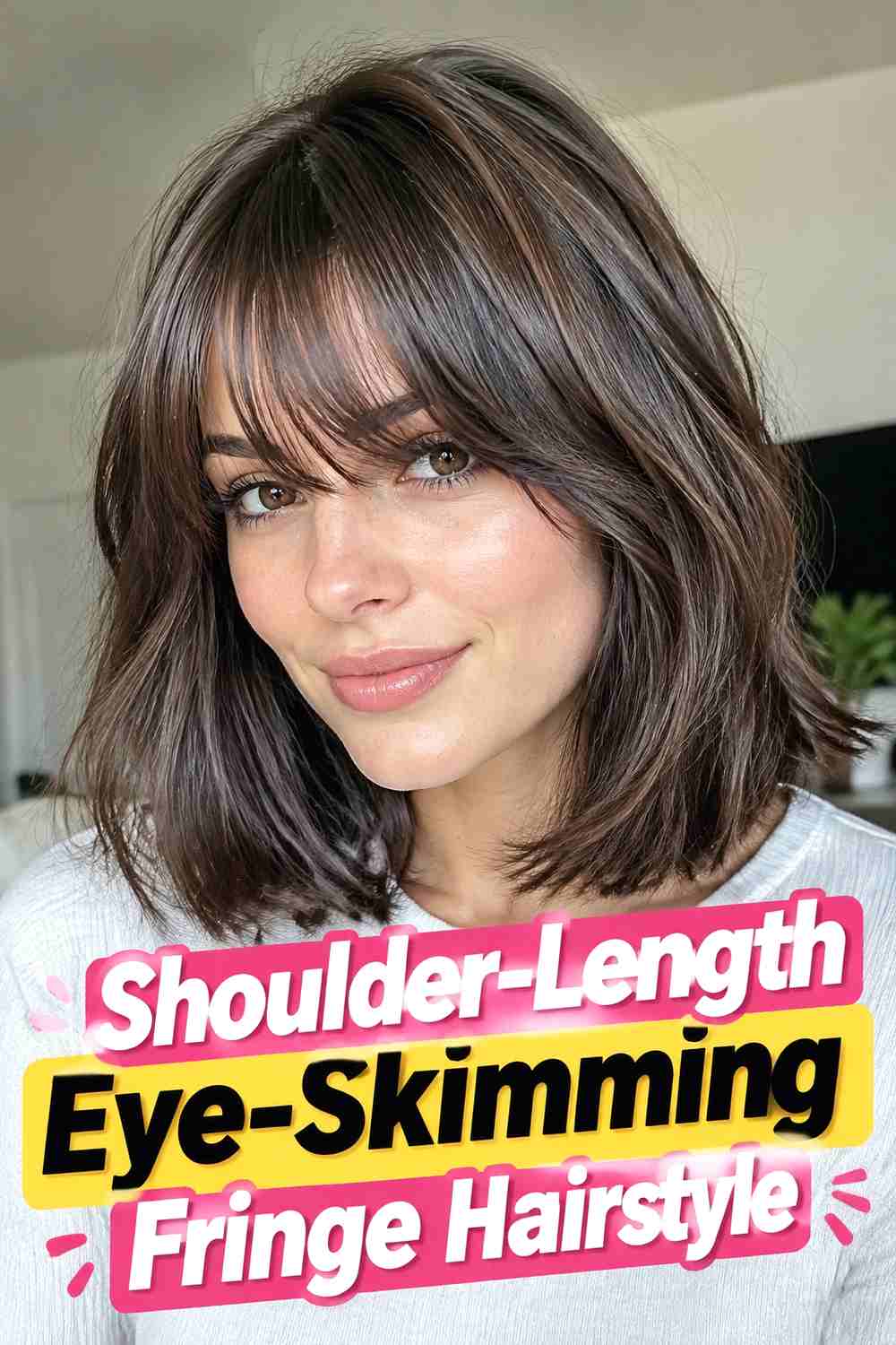 12. Shoulder Length Eye Skimming Fringe Hairstyle