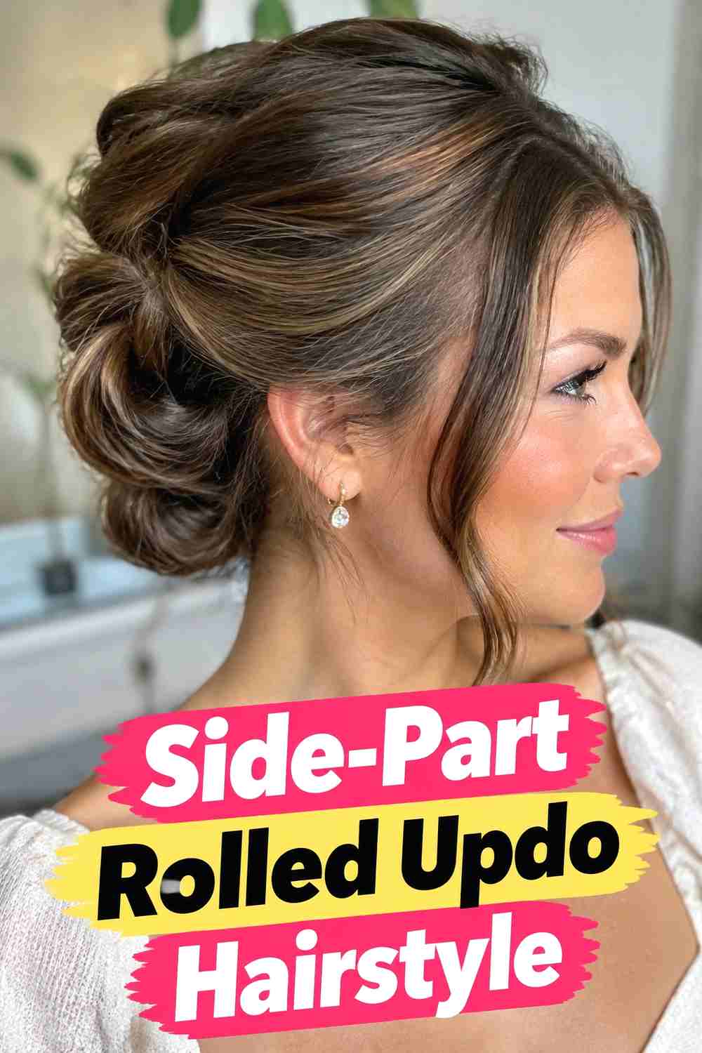 7. Side Part Rolled Updo Hairstyle