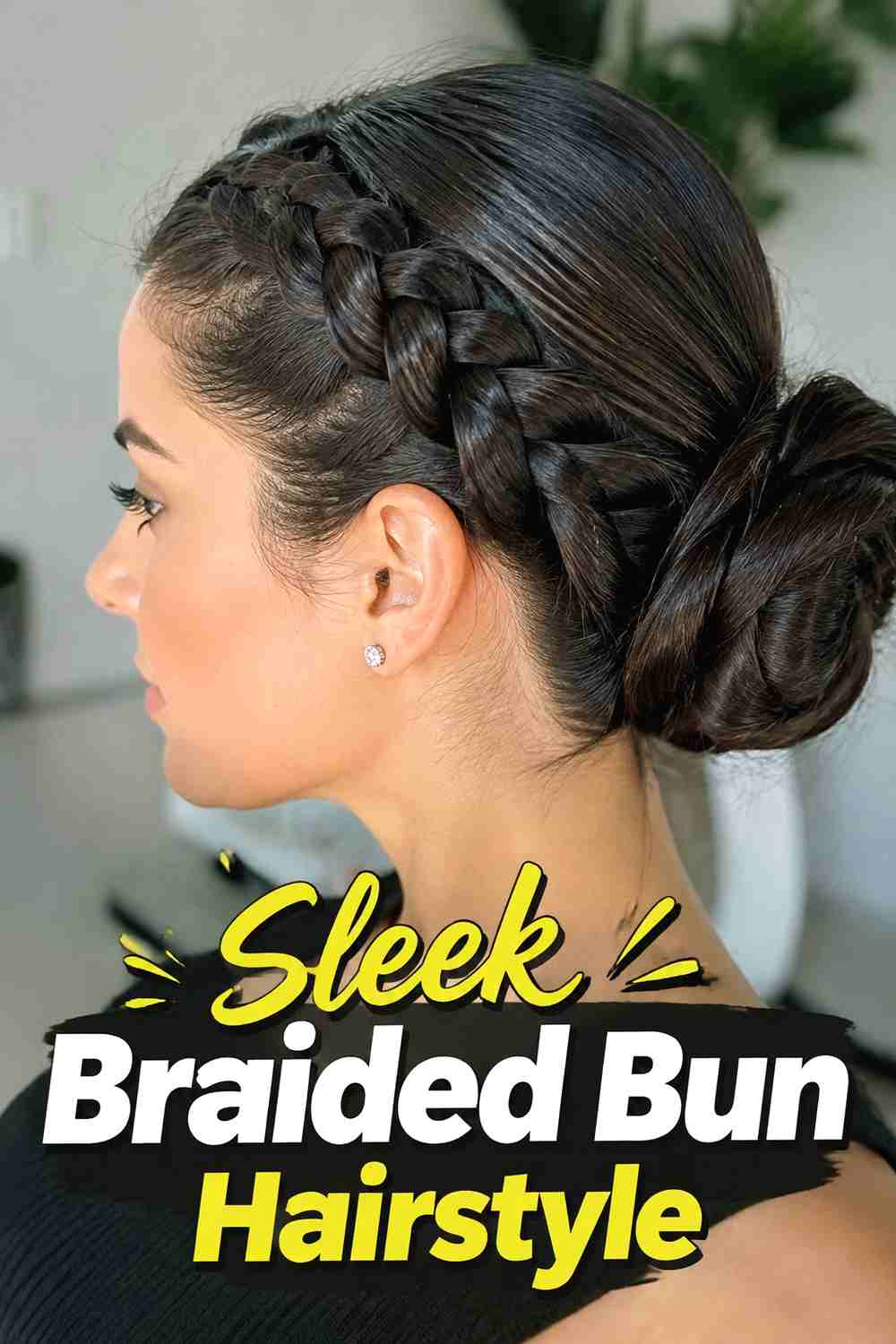 9. Sleek Braided Bun Hairstyle