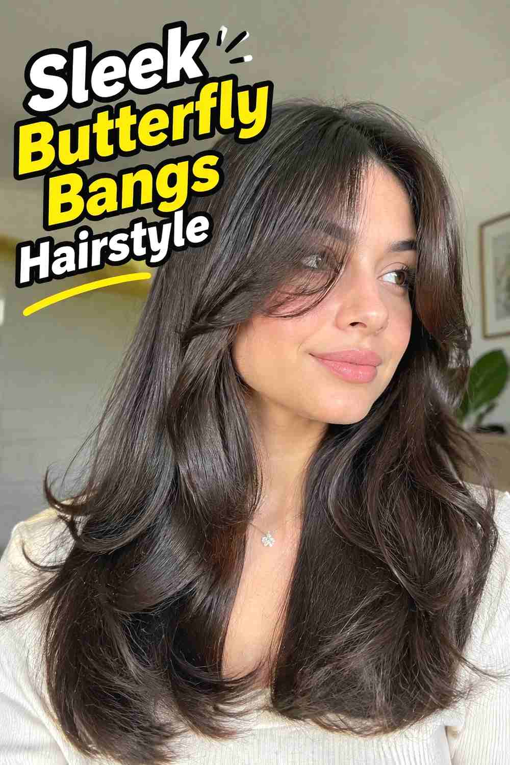 14. Sleek Butterfly Bangs Hairstyle