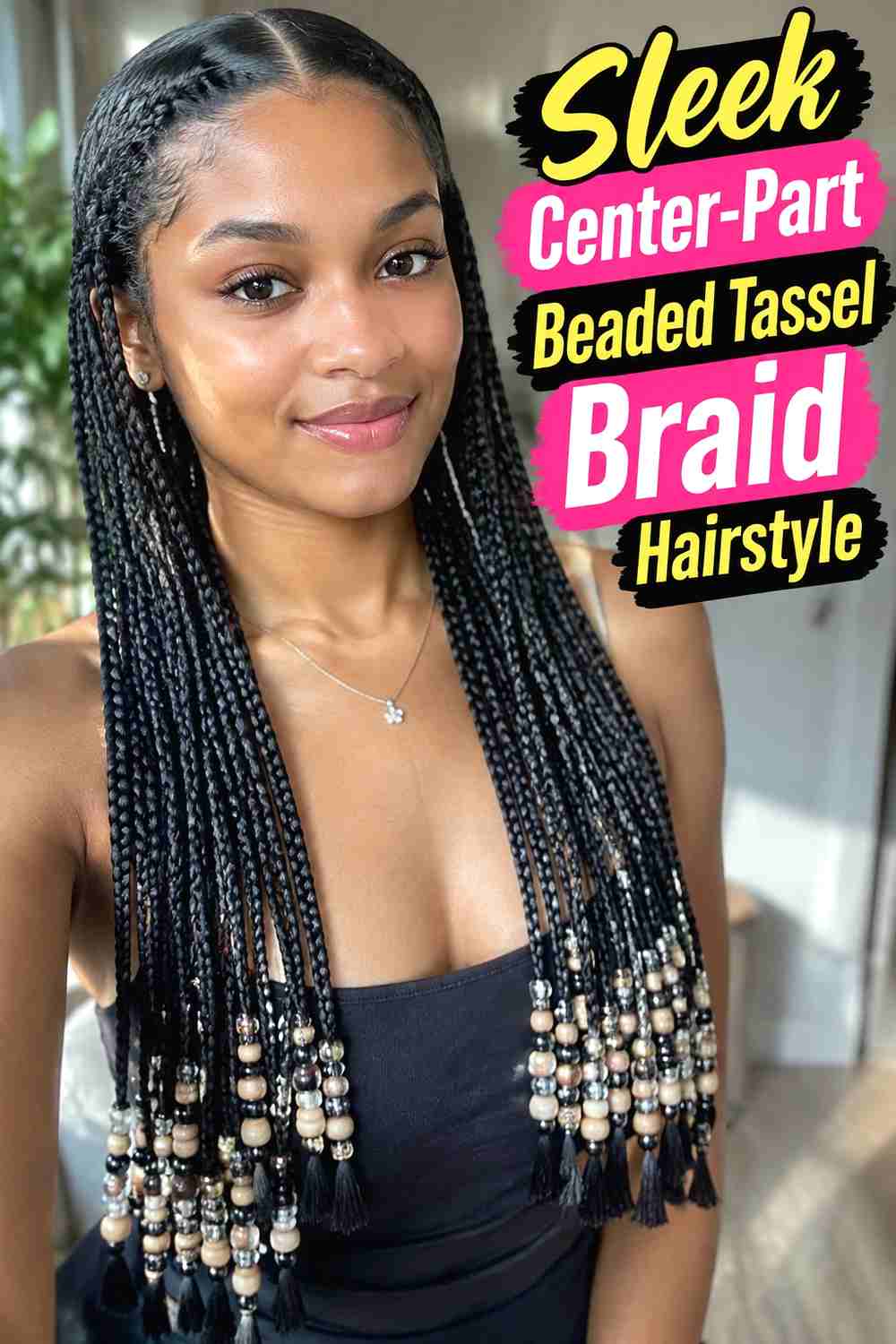 18. Sleek Center Part Beaded Tassel Braid Hairstyle