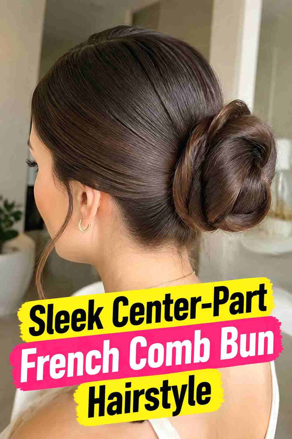 5. Sleek Center Part French Comb Bun Hairstyle